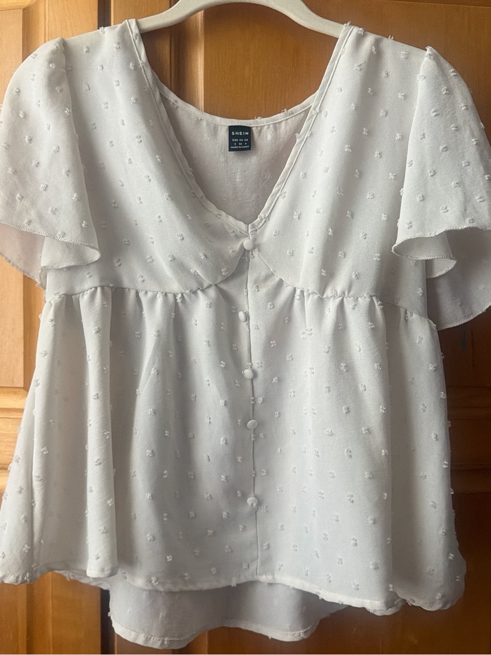 SHEIN White Swiss Dot V‑Neck Flutter Sleeve Blouse